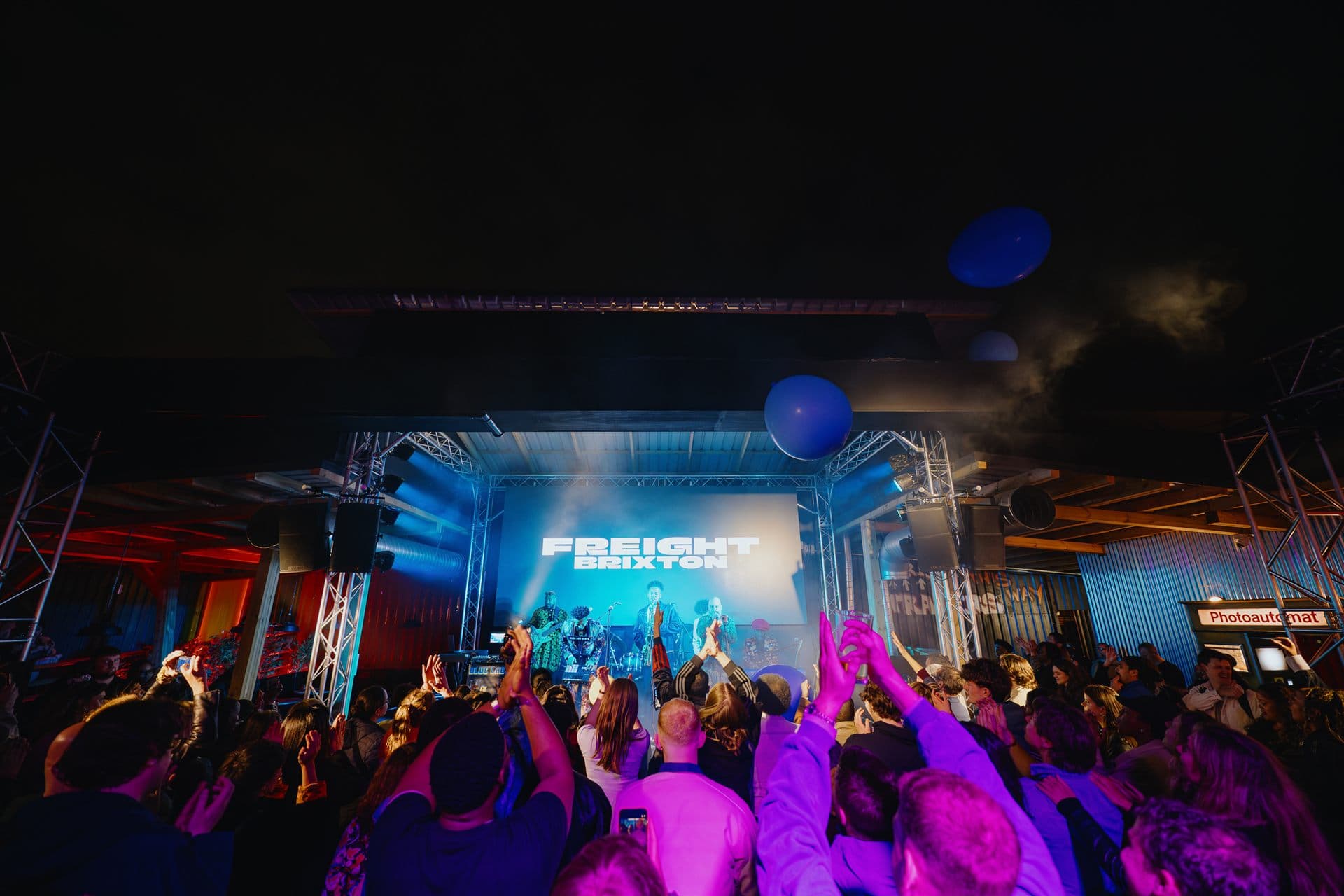 Hands in the air for a live performance on the Freight Brixton stage